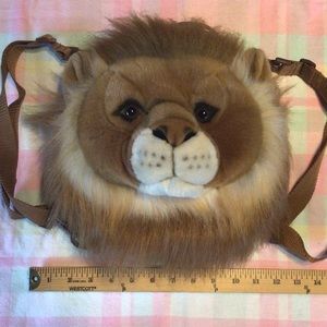 Lion head back pack with adjustable straps from The Museum Co.